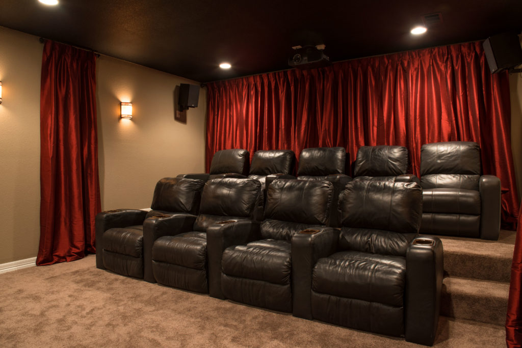 Home Theater stepped seating in basement home theater room