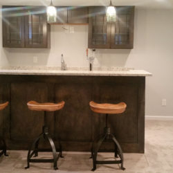 Wet bar in Littleton basement finishing project from Brothers Construction.
