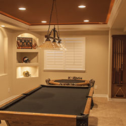 recessed pool cue rack in new basement finish