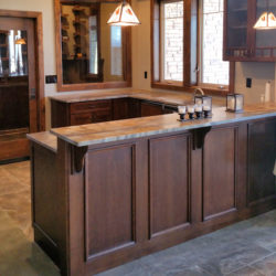 Sandalus Satin granite bar counter in Back Country Colorado basement