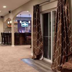 Recent basement finishing project picture featuring wet bar from Denver's leading finished basement contractor.