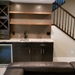 basement wt bar next to a staircase
